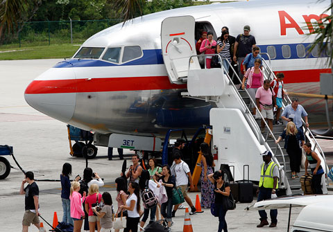AA plane unloading in Grand Cayman