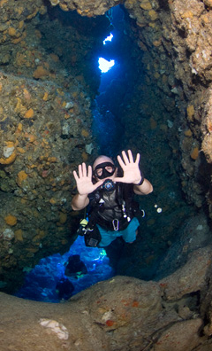 Mark Landman diving Cayman