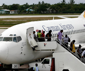 Cayman Airways Unloading 300x250