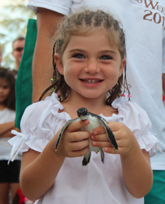 girl with turtle cayman