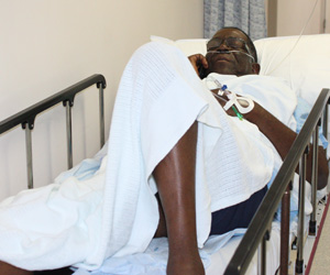 Frank McField hospital bed 300x250