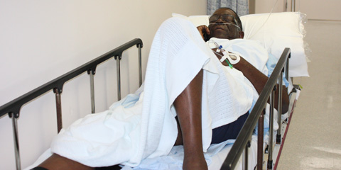 Frank McField hospital bed