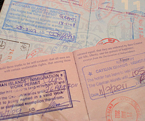passports cayman stamps 300x250