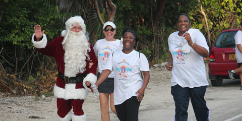 santa and ladies jingle bell run